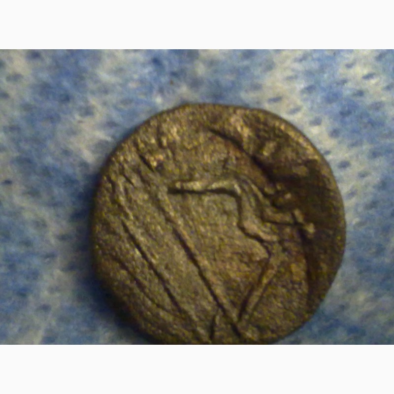 Фото 2. Монета древнего города Херсонес, лук и стрелы, Крым