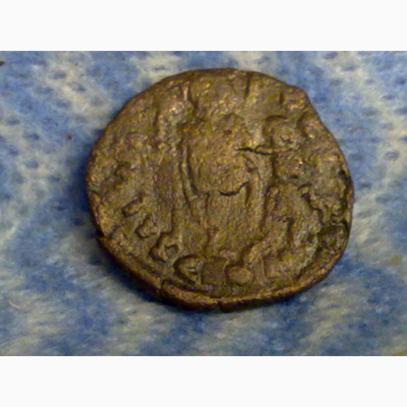 Фото 8. Древний Херсонес, реплика античной монеты, дева с луком и грифон