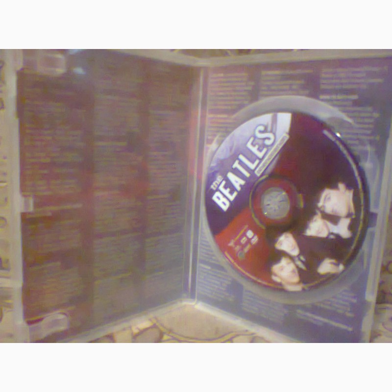 Фото 18. Коллекция лицензионных DVD дисков, с книгами, буклетом и копией билета на концерт