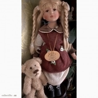 Продам коллекционную фарфоровую куклу